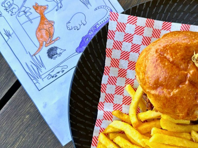 Image of a mouth-watering kids' meal with a burger and chips, available at The General Assembly, a beloved family-friendly restaurant in South Wharf, Victoria, known for its welcoming atmosphere and delicious menu.
